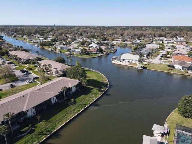 bird's eye view with a residential view and a water view