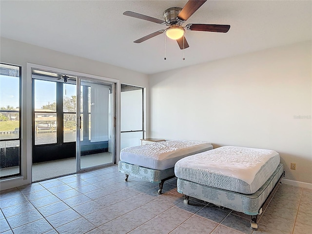 bedroom with access to outside, baseboards, and ceiling fan