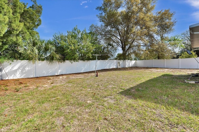 view of yard featuring a fenced backyard