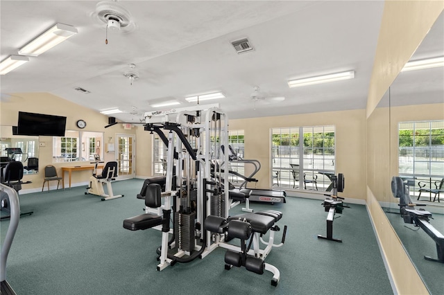 workout area featuring baseboards, a ceiling fan, lofted ceiling, and visible vents