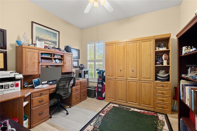 office space featuring light wood finished floors and ceiling fan