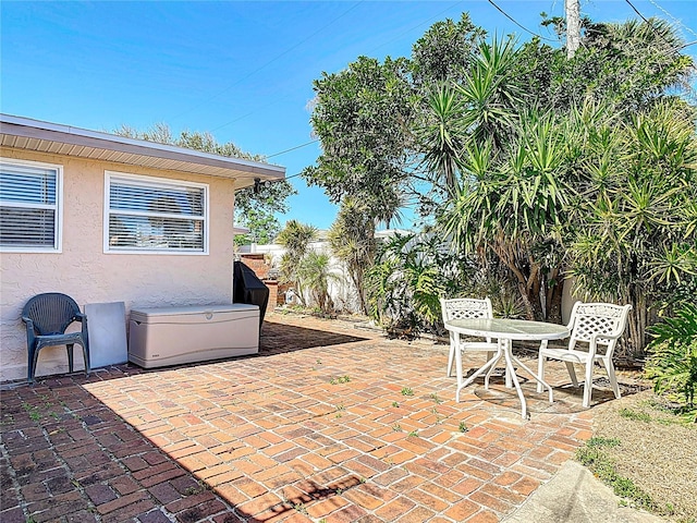 view of patio with fence