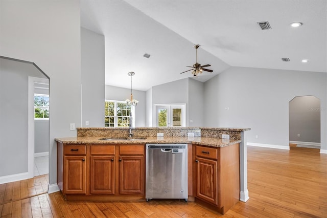 309 Crystal Lake Dr, Saint Augustine, FL 32084 - kitchen featuring visible vents, arched walkways, a sink, dishwasher, and ceiling fan with notable chandelier