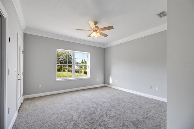 309 Crystal Lake Dr, Saint Augustine, FL 32084 - carpeted spare room with ornamental molding, baseboards, visible vents, and ceiling fan