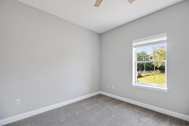 309 Crystal Lake Dr, Saint Augustine, FL 32084 - carpeted empty room with a ceiling fan and baseboards