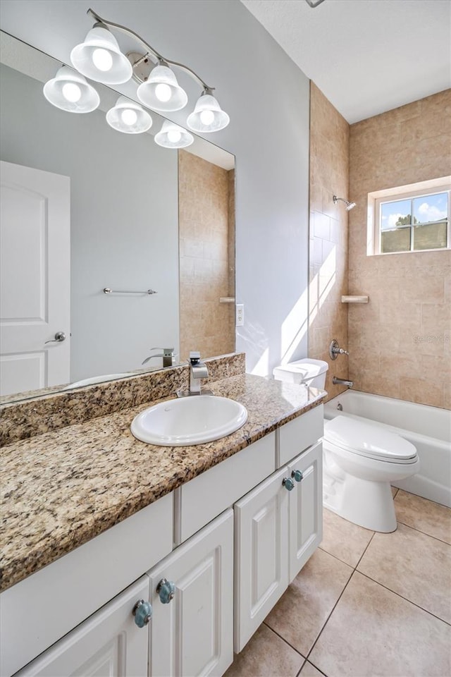 309 Crystal Lake Dr, Saint Augustine, FL 32084 - bathroom featuring toilet, bathtub / shower combination, vanity, and tile patterned flooring