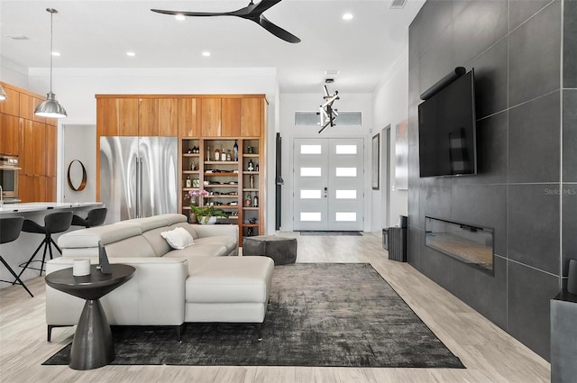 96 Del Palma Dr, Palm Coast, FL 32137 - living area featuring visible vents, light wood-style flooring, ceiling fan, recessed lighting, and french doors