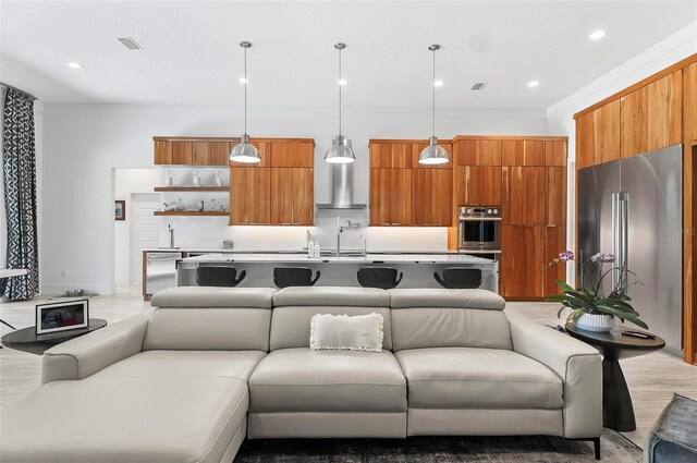96 Del Palma Dr, Palm Coast, FL 32137 - living room with visible vents, recessed lighting, and light wood-type flooring
