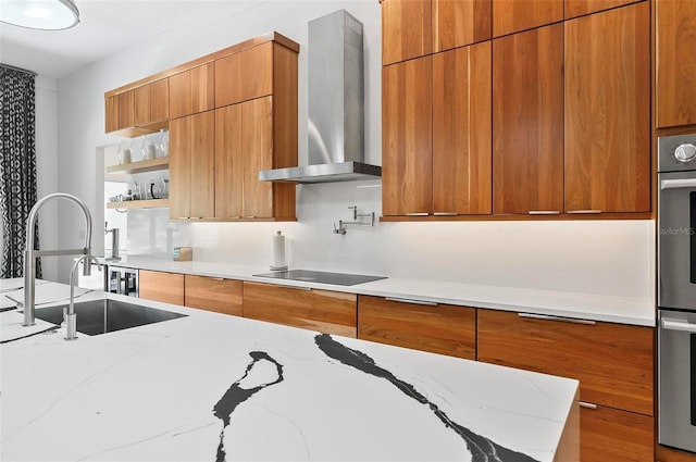 96 Del Palma Dr, Palm Coast, FL 32137 - kitchen featuring black electric stovetop, wall chimney range hood, modern cabinets, and a sink