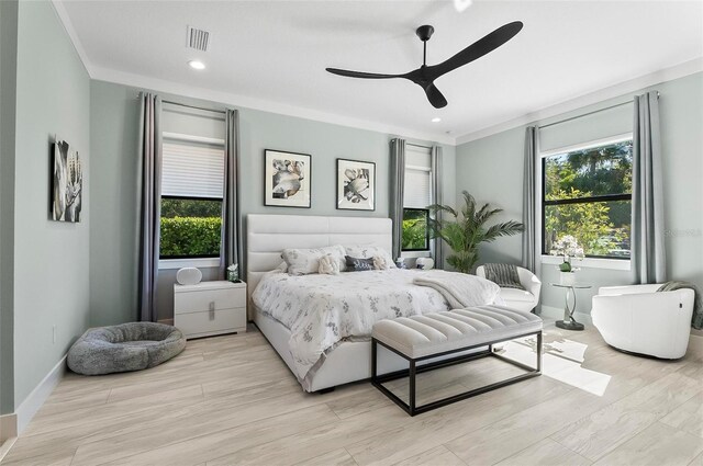 96 Del Palma Dr, Palm Coast, FL 32137 - bedroom with light wood-type flooring, ornamental molding, multiple windows, and visible vents