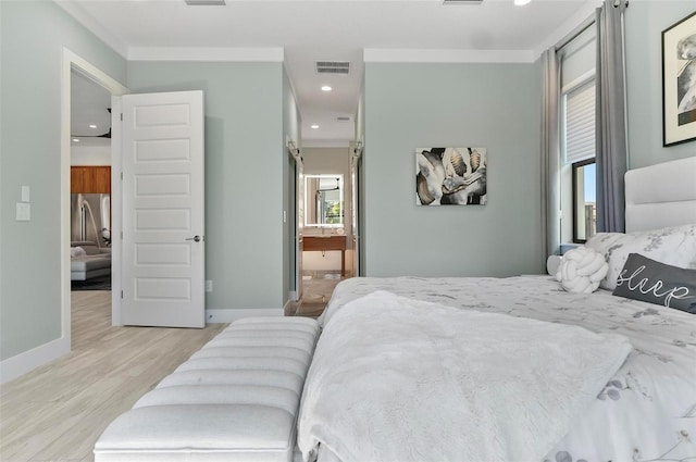96 Del Palma Dr, Palm Coast, FL 32137 - bedroom with baseboards, multiple windows, visible vents, and light wood-style floors