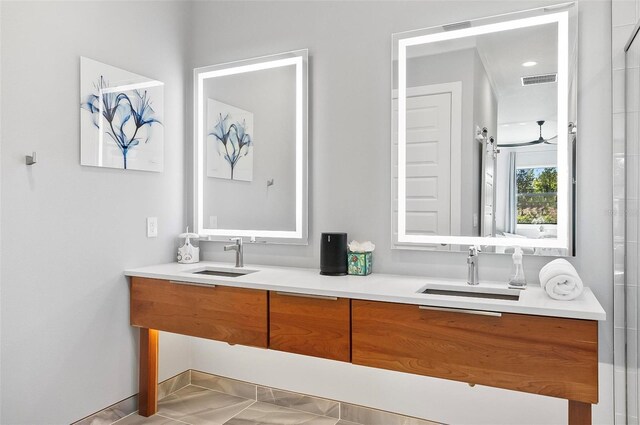 96 Del Palma Dr, Palm Coast, FL 32137 - full bath featuring double vanity, a sink, and visible vents