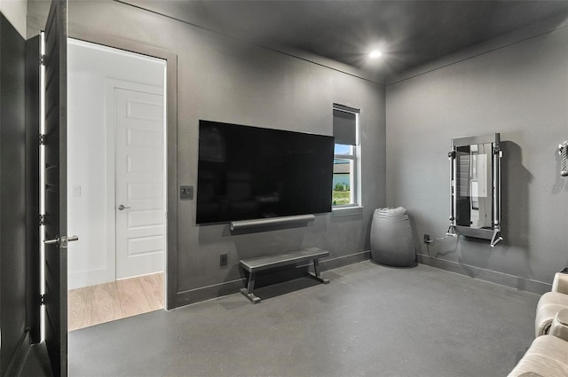 96 Del Palma Dr, Palm Coast, FL 32137 - living area with concrete flooring, baseboards, and recessed lighting