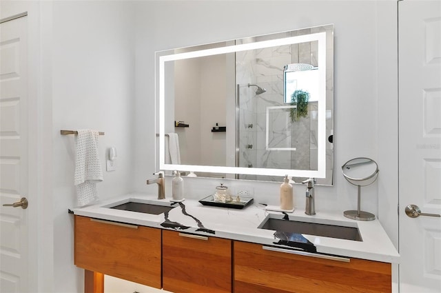 96 Del Palma Dr, Palm Coast, FL 32137 - bathroom with double vanity, a sink, and a marble finish shower