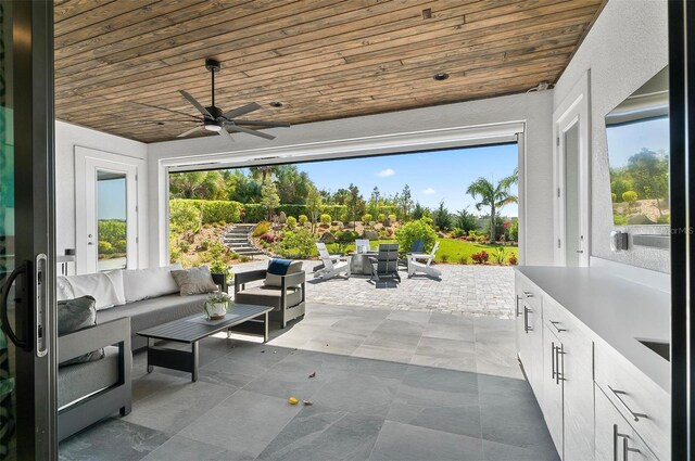 96 Del Palma Dr, Palm Coast, FL 32137 - view of patio / terrace featuring an outdoor living space, ceiling fan, and outdoor dining area