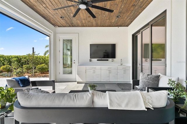 96 Del Palma Dr, Palm Coast, FL 32137 - exterior space featuring an outdoor living space, exterior kitchen, and a ceiling fan