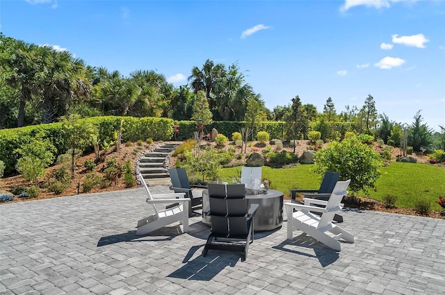 96 Del Palma Dr, Palm Coast, FL 32137 - view of patio / terrace featuring stairs and a fire pit