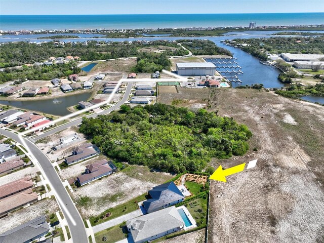 96 Del Palma Dr, Palm Coast, FL 32137 - drone / aerial view featuring a water view and a residential view