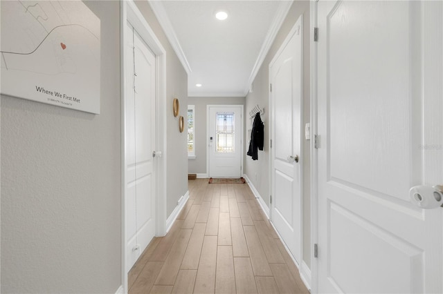 49 Narvarez Ave, Saint Augustine, FL 32084 - doorway to outside featuring ornamental molding, baseboards, light wood finished floors, and recessed lighting