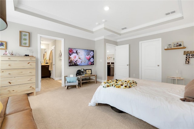 49 Narvarez Ave, Saint Augustine, FL 32084 - bedroom featuring a tray ceiling, ornamental molding, light carpet, baseboards, and ensuite bathroom