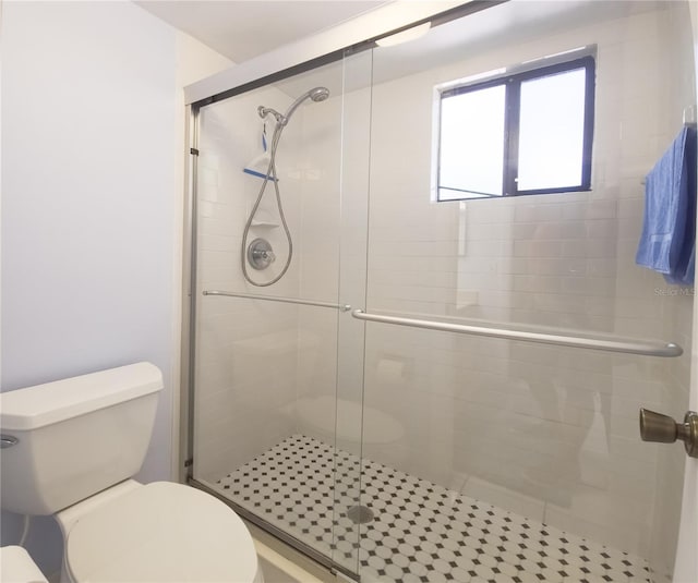 41 Oxford Ln Unit 41, Palm Coast, FL 32137 - bathroom with toilet and a stall shower