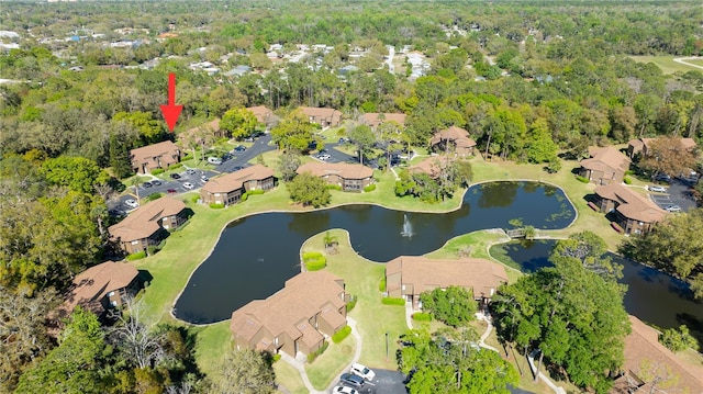 41 Oxford Ln Unit 41, Palm Coast, FL 32137 - drone / aerial view featuring a water view, a residential view, and a view of trees