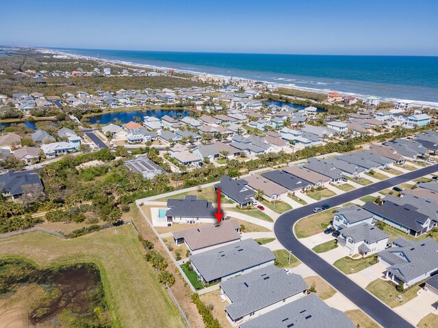 68 Los Lagos Blvd, Palm Coast, FL 32137 - aerial view of property and surrounding area featuring nearby suburban area and a nearby body of water