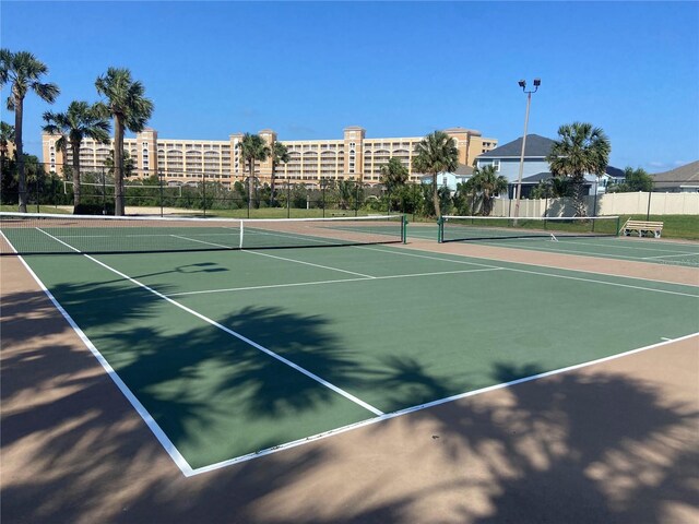 68 Los Lagos Blvd, Palm Coast, FL 32137 - view of tennis court featuring community basketball court