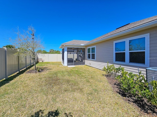 68 Los Lagos Blvd, Palm Coast, FL 32137 - view of yard featuring a sunroom and cooling unit
