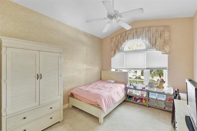 3220 Galty Cir, Ormond Beach, FL 32174 - bedroom with light carpet, vaulted ceiling, and ceiling fan