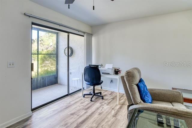 31 Catalonia Court E, Saint Augustine, FL 32086 - home office featuring baseboards, wood finished floors, and ceiling fan