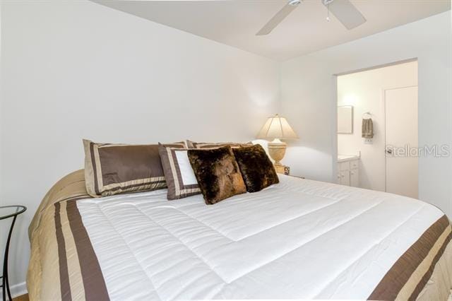 31 Catalonia Court E, Saint Augustine, FL 32086 - bedroom featuring ceiling fan and connected bathroom