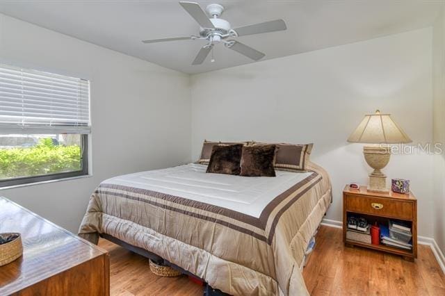 31 Catalonia Court E, Saint Augustine, FL 32086 - bedroom with ceiling fan, baseboards, and wood finished floors