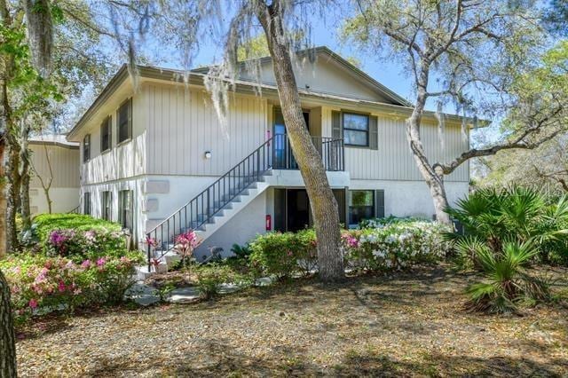 31 Catalonia Court E, Saint Augustine, FL 32086 - rear view of property with stairway