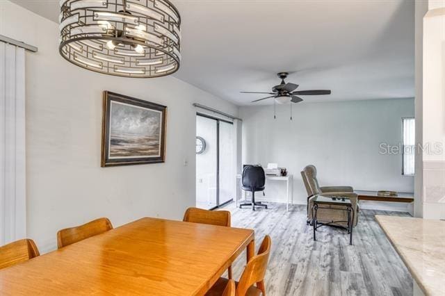 31 Catalonia Court E, Saint Augustine, FL 32086 - dining space featuring a ceiling fan and wood finished floors