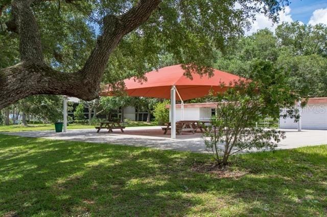 31 Catalonia Court E, Saint Augustine, FL 32086 - surrounding community featuring a lawn