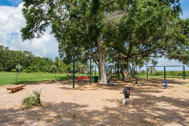 31 Catalonia Court E, Saint Augustine, FL 32086 - surrounding community with fence and playground community