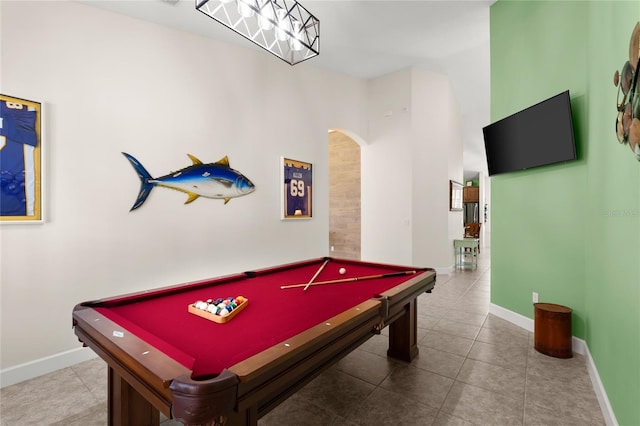 1316 Harwick Ln, Ormond Beach, FL 32174 - recreation room featuring arched walkways, tile patterned flooring, pool table, and baseboards