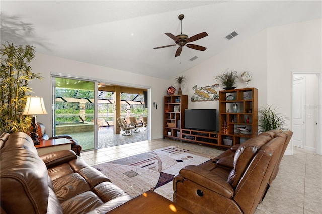 1316 Harwick Ln, Ormond Beach, FL 32174 - living room with light tile patterned flooring, ceiling fan, and high vaulted ceiling
