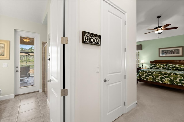 1316 Harwick Ln, Ormond Beach, FL 32174 - bedroom featuring access to exterior, baseboards, and a ceiling fan