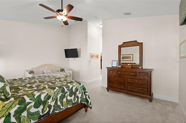 1316 Harwick Ln, Ormond Beach, FL 32174 - bedroom featuring light colored carpet, baseboards, and a ceiling fan