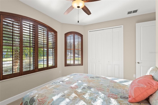 1316 Harwick Ln, Ormond Beach, FL 32174 - bedroom featuring baseboards, a closet, a ceiling fan, and carpet floors
