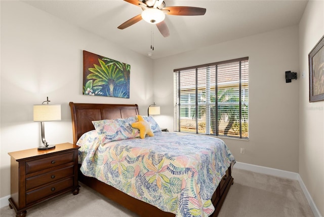 1316 Harwick Ln, Ormond Beach, FL 32174 - bedroom with light carpet, baseboards, and ceiling fan