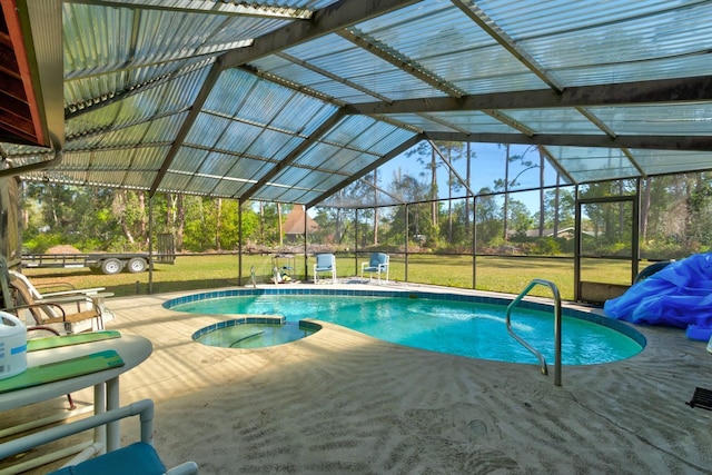 9 Shadow Ln, Ormond Beach, FL 32174 - view of pool with a patio area, a lawn, a pool with connected hot tub, and glass enclosure