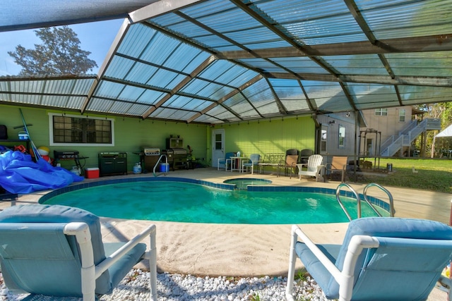 9 Shadow Ln, Ormond Beach, FL 32174 - view of pool featuring a patio and a pool with connected hot tub