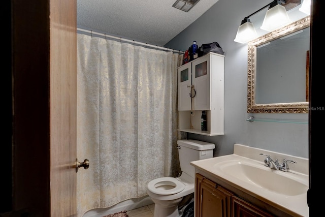 9 Shadow Ln, Ormond Beach, FL 32174 - full bathroom featuring toilet, a textured ceiling, vanity, a shower with shower curtain, and tile patterned flooring