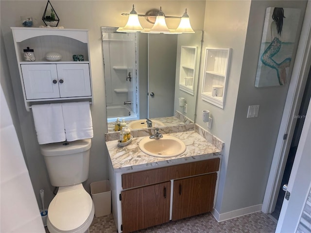 787 Alhambra Ave, Saint Augustine, FL 32086 - full bathroom with baseboards, a tub, toilet, and vanity