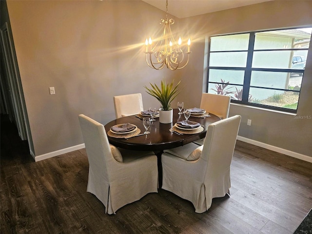 11 Cheyenne Ct, Palm Coast, FL 32137 - dining space with a chandelier, baseboards, dark wood-style flooring, and vaulted ceiling
