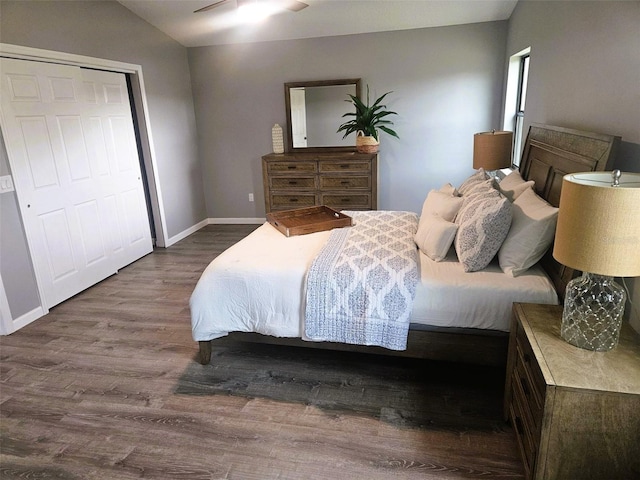 11 Cheyenne Ct, Palm Coast, FL 32137 - bedroom with wood finished floors, baseboards, and vaulted ceiling