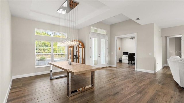 29 Old Oak Dr S, Palm Coast, FL 32137 - foyer with baseboards, visible vents, a raised ceiling, and dark wood-style flooring
